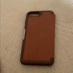 Brown, black and, tan otter box flip case